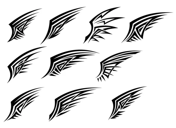 Set de tatuajes de alas tribales negros — Vector stock ...