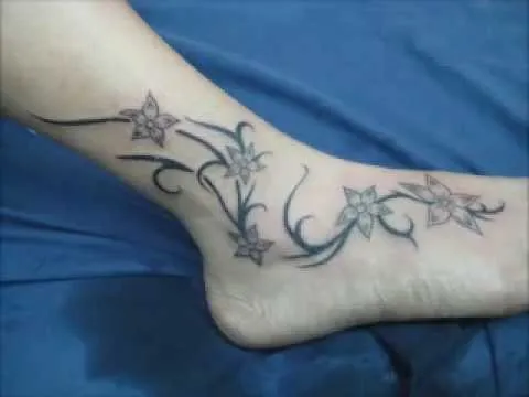 tatuaje enredadera tribal con flores en el tobillo - YouTube