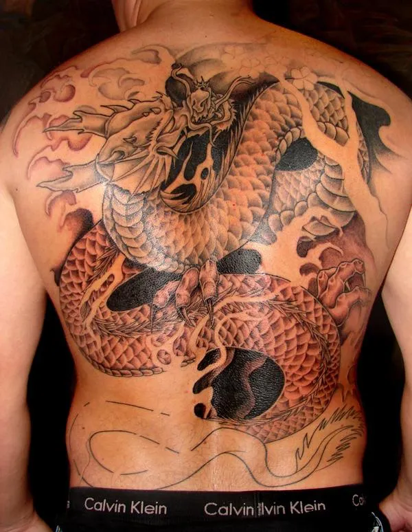 30 Awesome Dragon Tattoo Designs | Cuded