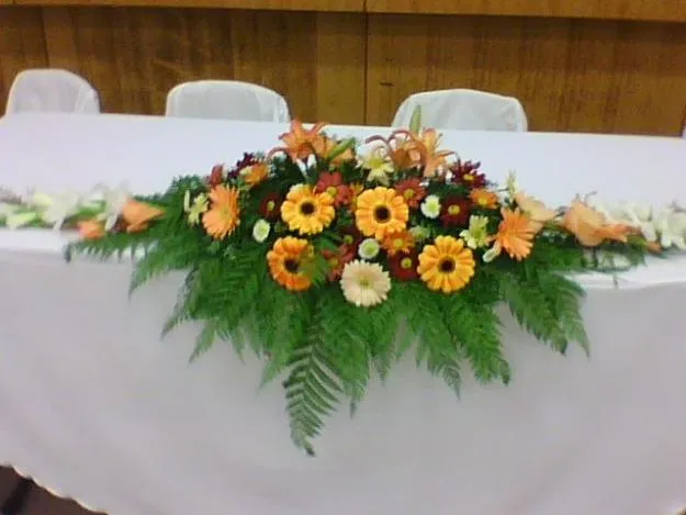 Arreglos florales para mesas de matrimonio - Imagui