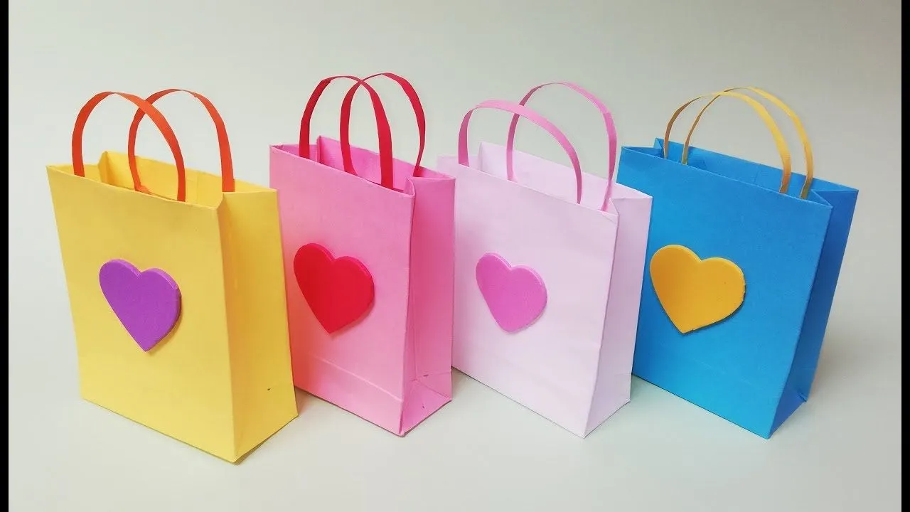 Como hacer bolsas de papel para regalo. Muy facil - YouTube