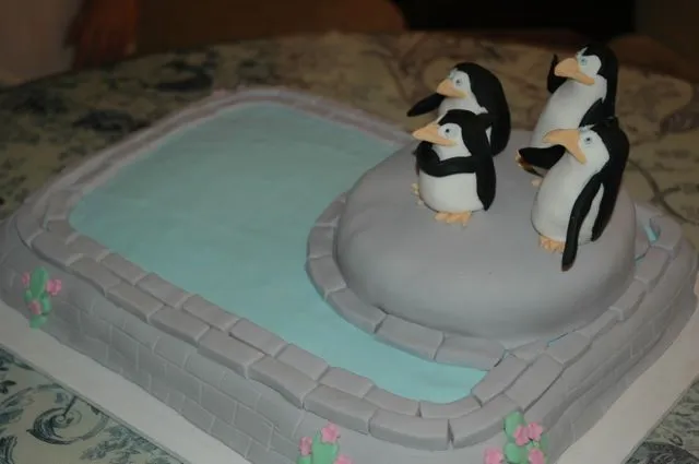 Botones sobre el pastel: Tarta pingüinos de Madagascar