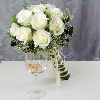 Centros de mesa para boda: Decoración de la boda con rosas blancas