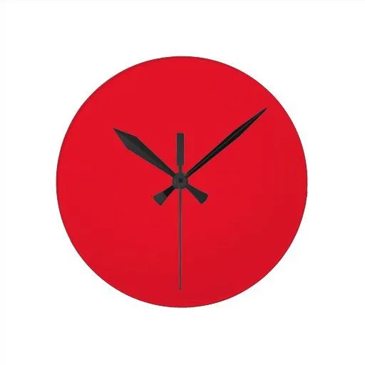 Medio del color rojo redondo reloj de pared de Zazzle.