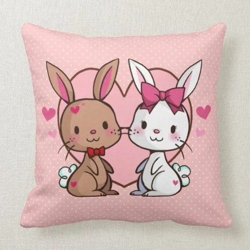 Almohada de los conejitos del amor de Zazzle.