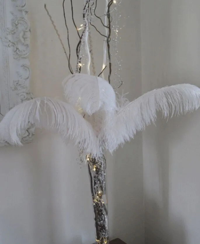 Plumas en la decoración de tu boda www.wowqueboda.com