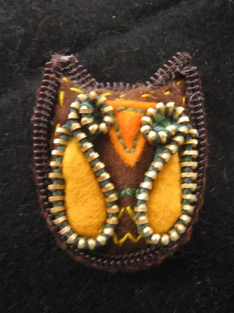 Buho hecho con cremalleras - Imagui