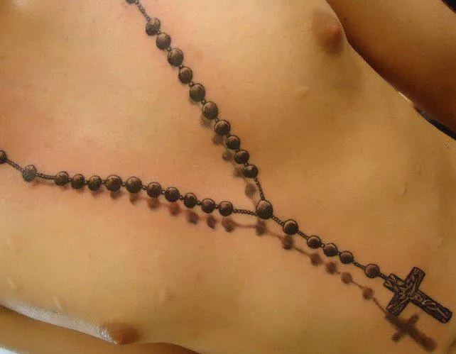 Forasteiro Tattoo: Tatuagem de Crucifixo