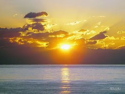 Foto Bazar: atardecer - mar - cielos - nubes - luz - fotografía