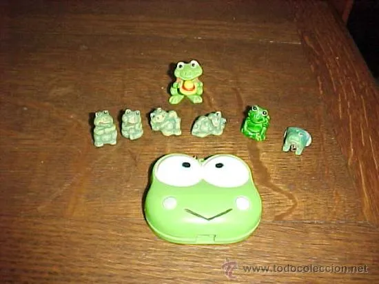 GRACIOSA COLECCION DE RANAS. 5 DE CERAMICA. UN COLGANTE. UNA DE ...