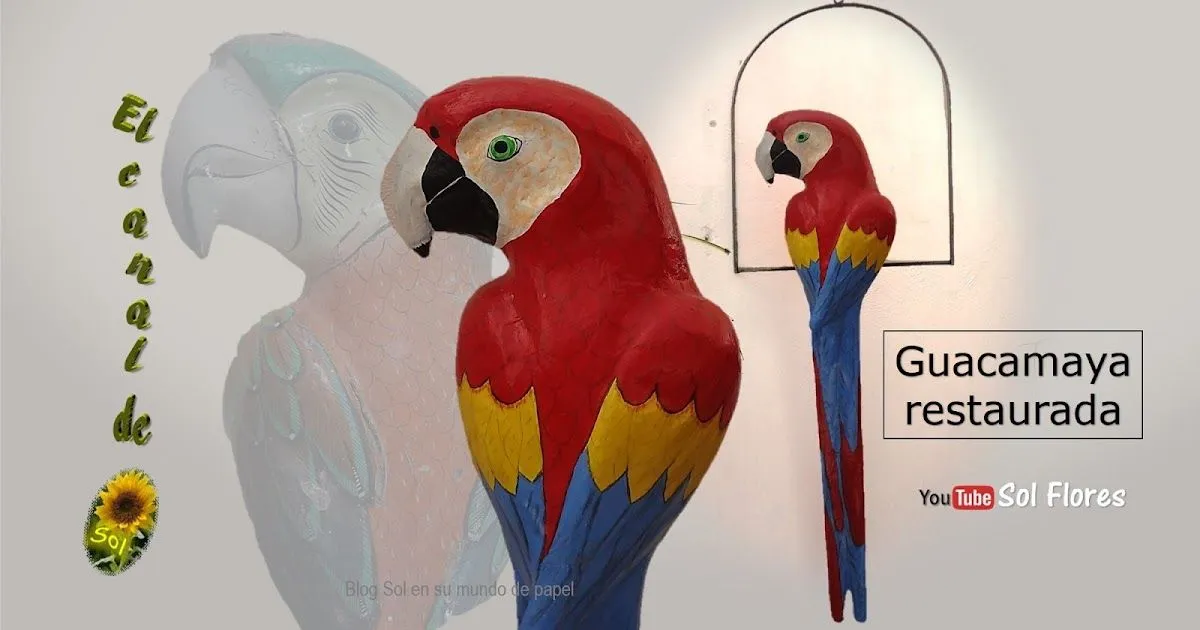 Guacamaya de papel maché restaurada