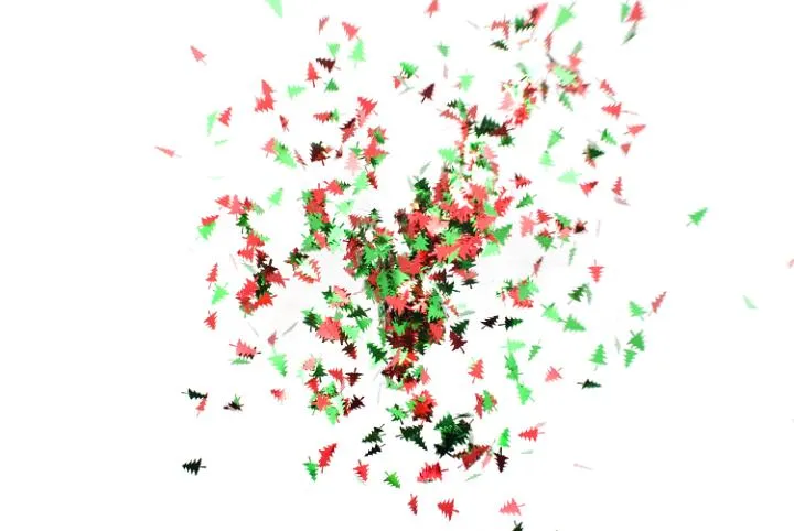  ... image composed of flying christmas tree shaped confetti pieces