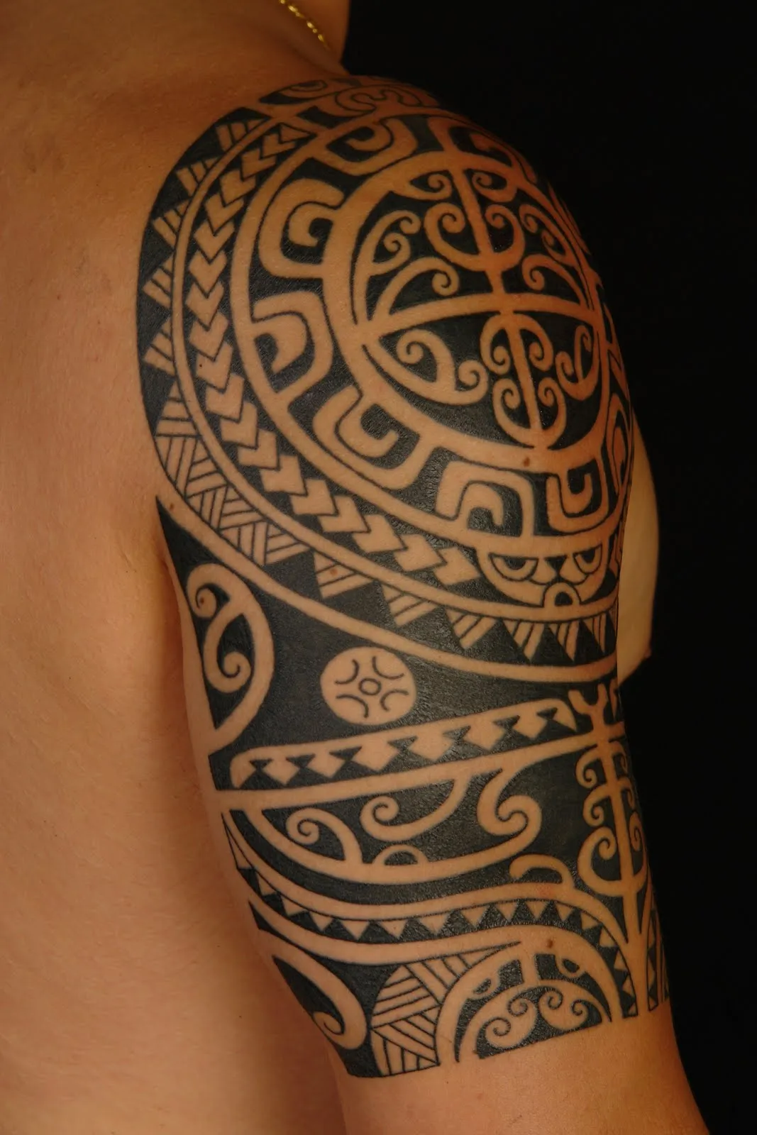 Koru Tattoo: Polynesian Shoulder Tattoo On Anthony