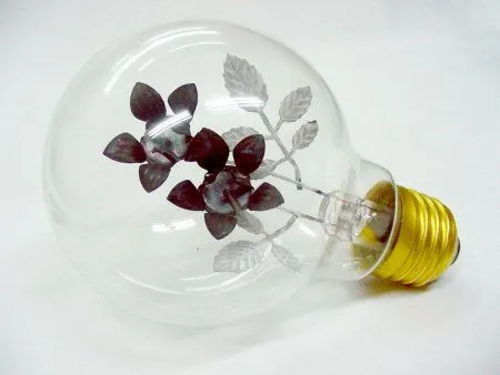 Lámpara luminiscente de neón con electrodos en forma de flores.