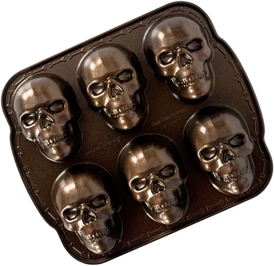 Nordic Ware - Molde para hornear de Halloween, diseño de calavera  embrujada, color bronce : Amazon.com.mx: Hogar y Cocina