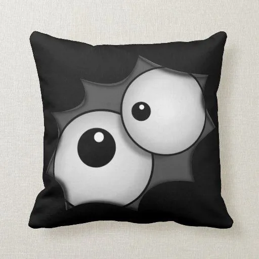 Ojos locos del dibujo animado almohadas | Zazzle