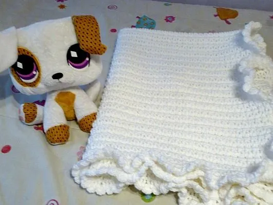 Un pollo que toca el piano: Manta de crochet para bebé