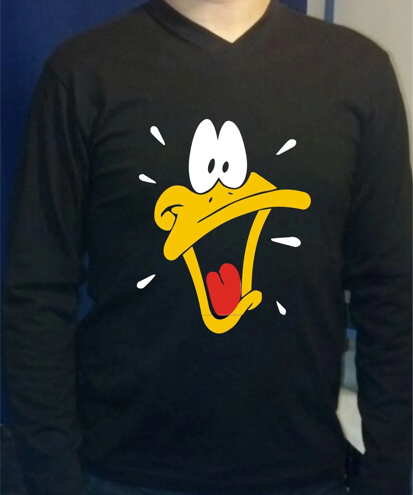 Remera mangas largas con " cara de pato Lucas".... vos la pediste ...