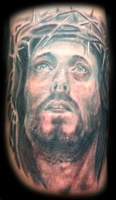 TATUAJE DE LA CARA DE CRISTO