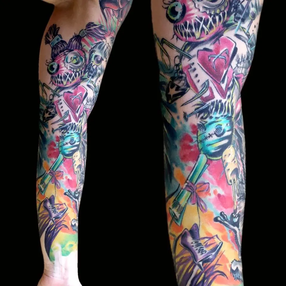 Tatuaje de Colores en Brazo - Buscatutattoo