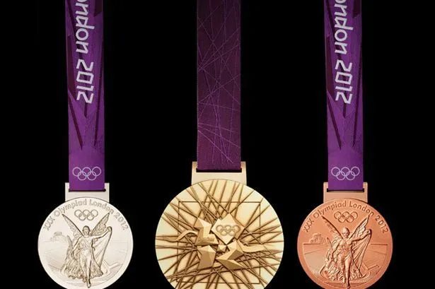 The London 2012 Olympic medals designed by British artist David ...