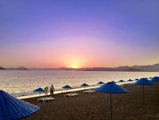 The most beautiful sunsets at Calis Beach taken from the quieter ...