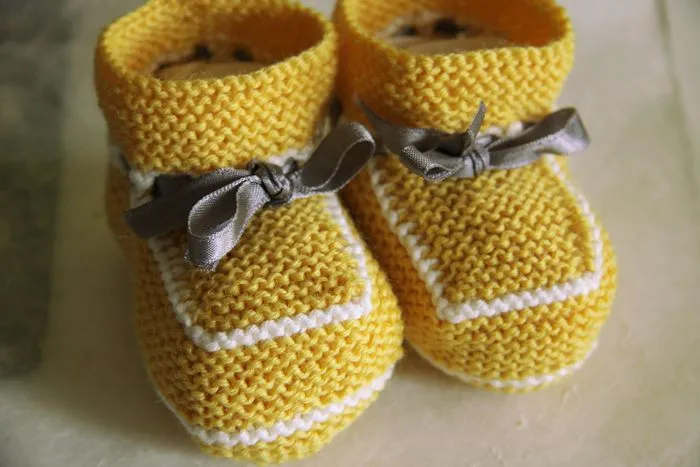 A título provisional: Calcetines y patucos a tutiplé