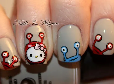 Uñas decoradas de Hello Kitty para Halloween