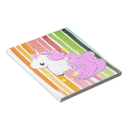 Unicornio rosado del dibujo animado con la libreta blocs de Zazzle.